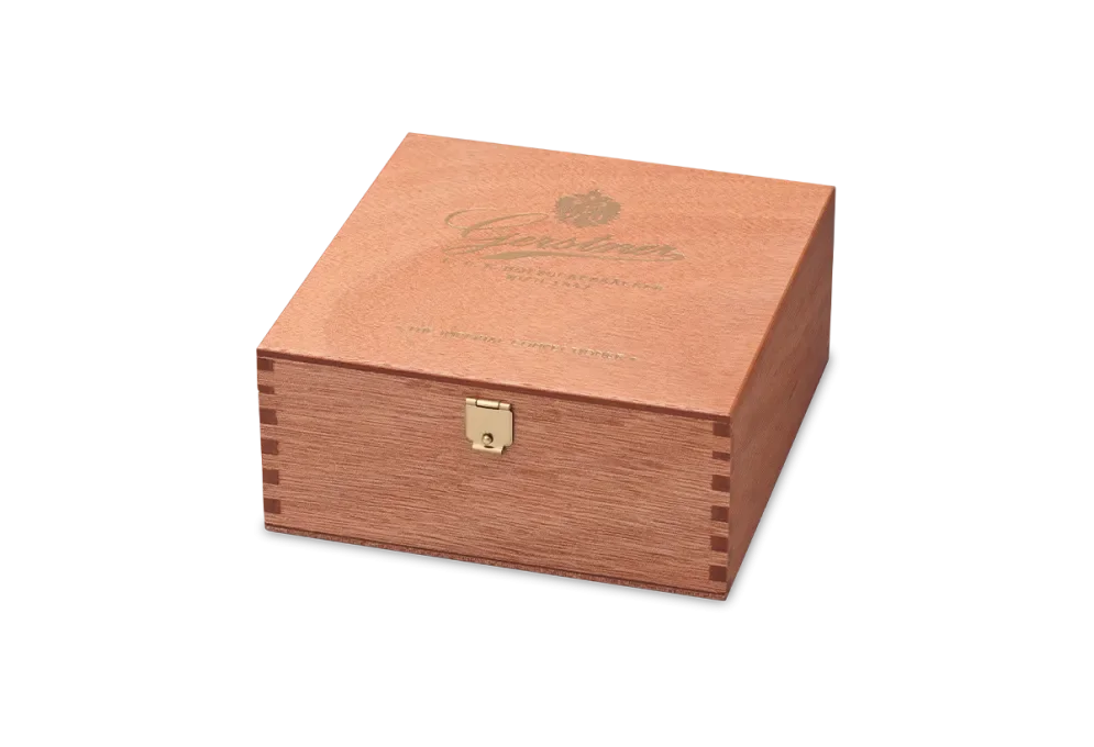 Gabon cake box with gold coloured embossed print and pronged corner joint