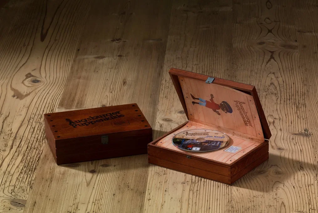 DVD wooden case made of birch plywood, stained and varnished, with screen printing and decorative grooves from the manufacturer Scheffauer Holzwaren