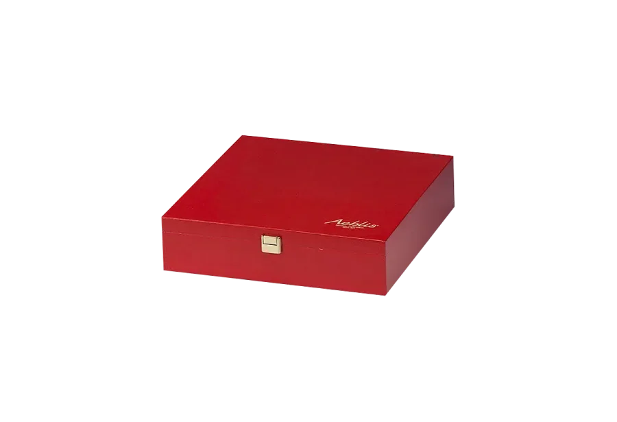 Cake box made of birch plywood, red lacquered and with golden embossed printing